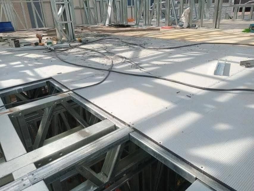 Panel installation on a steel-structure work platform